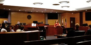 Judge Lark Cowart talks with Geneva Community High School students during a recent visit from their Business class.