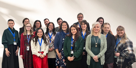 Dr. Alexandra Tsang, Director of the Kane County Diagnostic Center (front), pictured with staff, postdoctoral fellows, interns, externs, and support personnel.