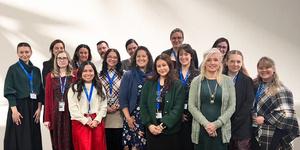 Dr. Alexandra Tsang, Director of the Kane County Diagnostic Center (front), pictured with staff, postdoctoral fellows, interns, externs, and support personnel.